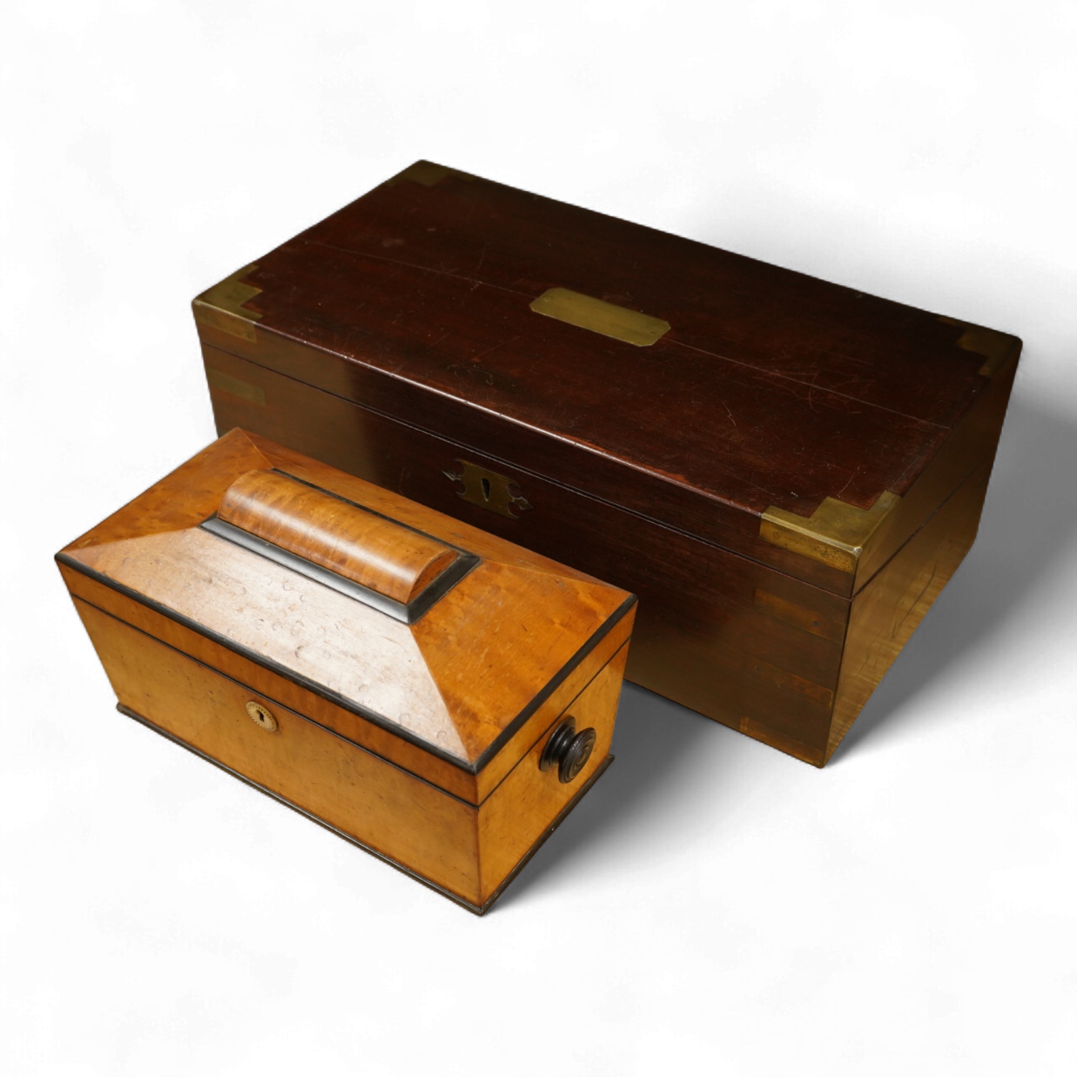 A bird’s-eye maple tea caddy and a brass mounted writing slope, latter 50cm wide